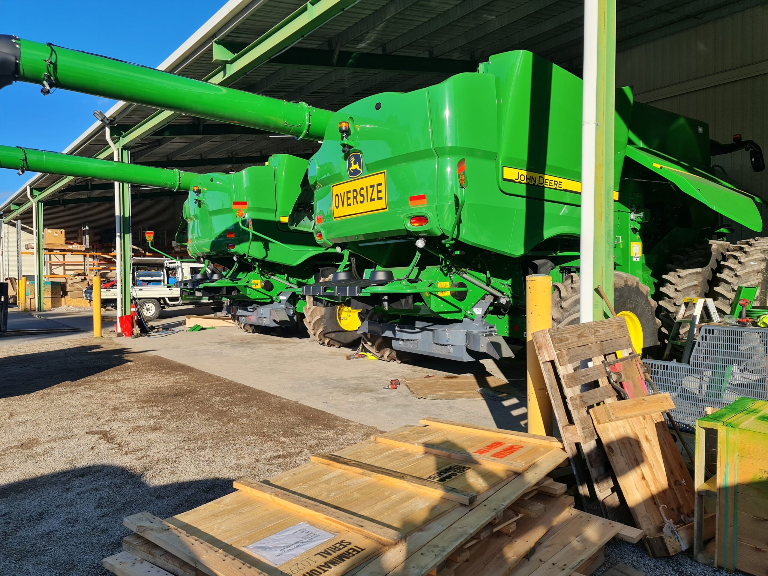 Combine harvesters in a machinery workshop