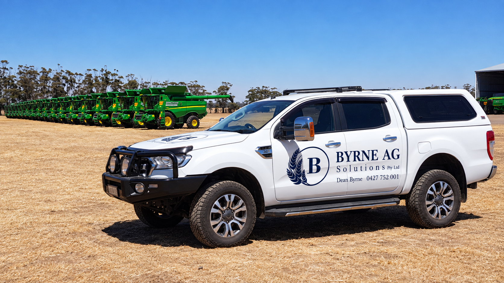 Service vehicle alongside a fleet of combine harvesters