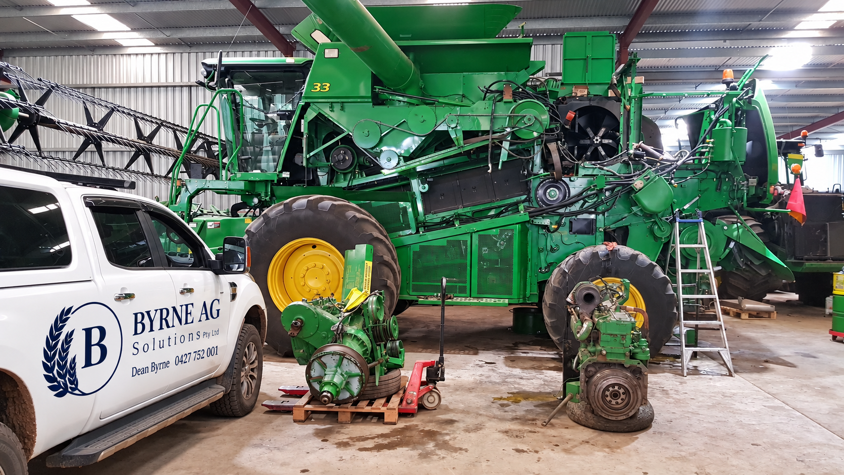 Combine harvester undergoing workshop servicing